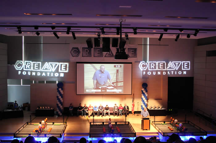 Students competing in a robotics match