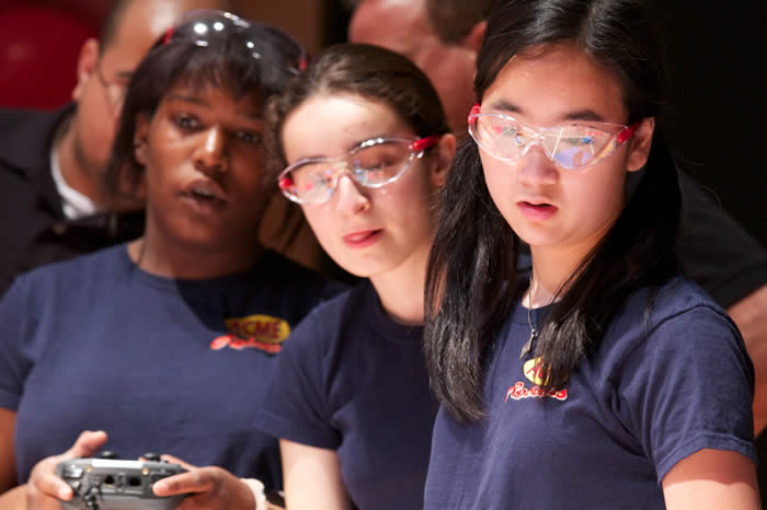 Students competing at a robotics event